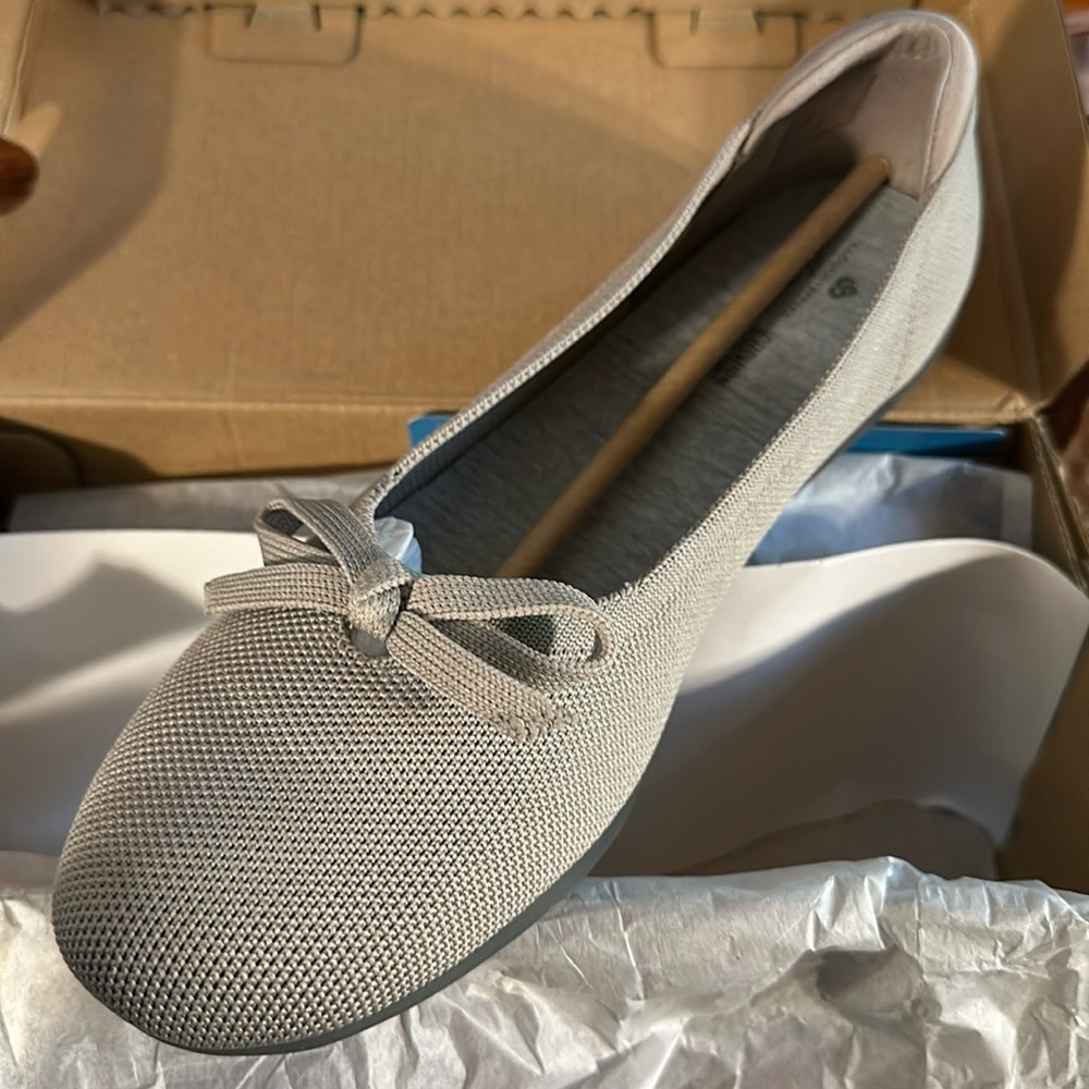 Carly Hope Bow Knit flat. Washable-line dry. Removable insole, cushion padding.
